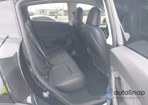 2025 Tesla Model Y Long Range Dual Motor Rear-Wheel Drive from USA, damaged, VIN 7SAYGDED4SA367652